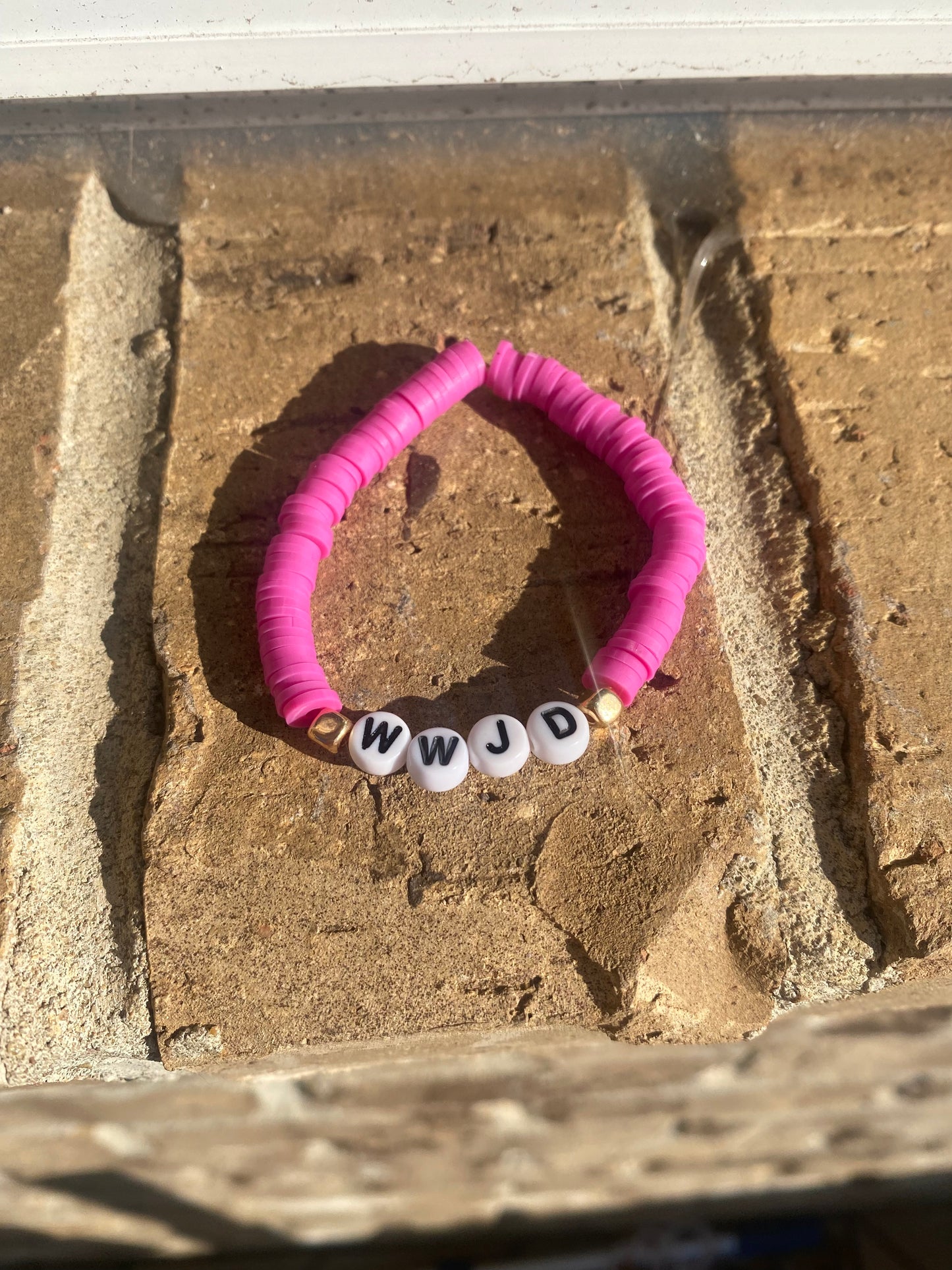 WWJD bracelet (hot pink)